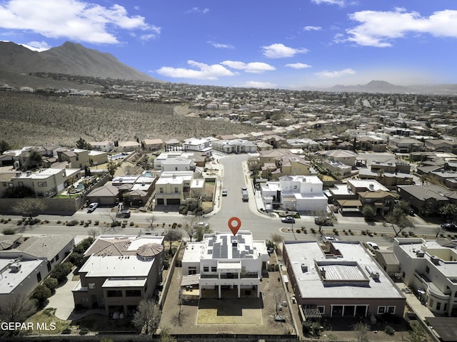 birds eye view of property featuring a residential view and a mountain view