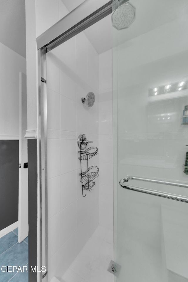 full bathroom with a shower stall