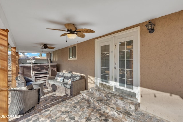 view of patio featuring an outdoor hangout area, french doors, and ceiling fan