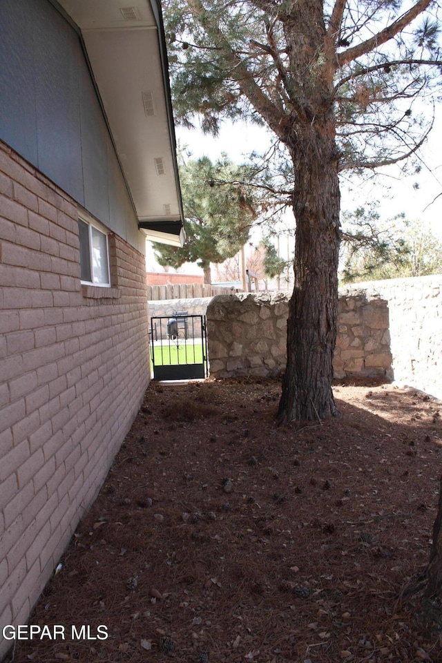 view of yard featuring fence