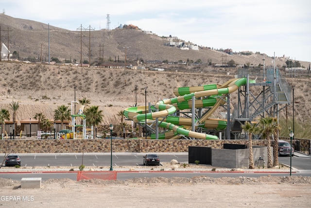 community playground featuring a mountain view