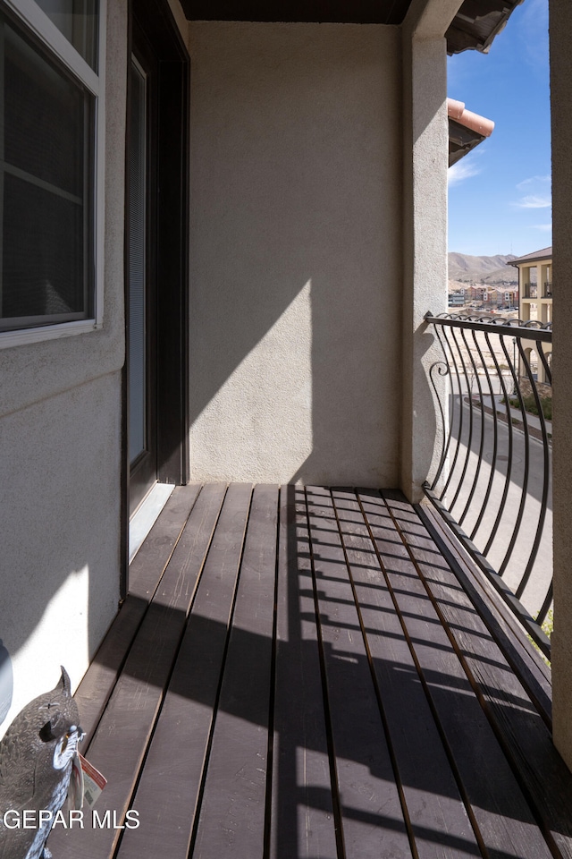 balcony featuring a mountain view