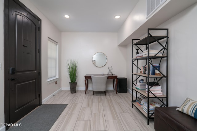 office with recessed lighting, visible vents, and baseboards