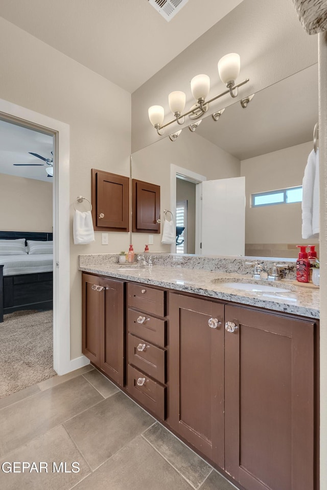 bathroom with visible vents, tile patterned flooring, and vanity