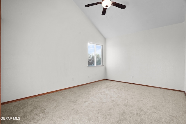 unfurnished room featuring ceiling fan, carpet flooring, baseboards, and high vaulted ceiling