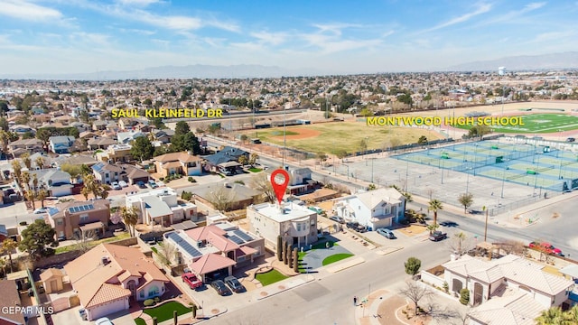 bird's eye view with a residential view and a mountain view