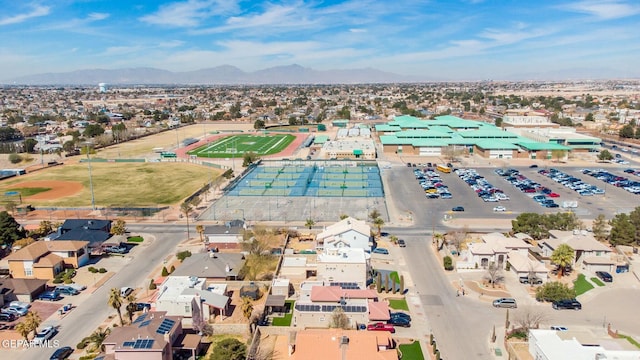 birds eye view of property with a mountain view