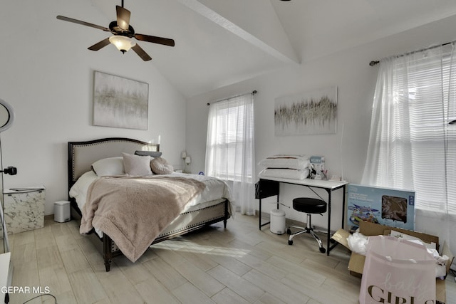 bedroom with lofted ceiling, ceiling fan, and wood tiled floor