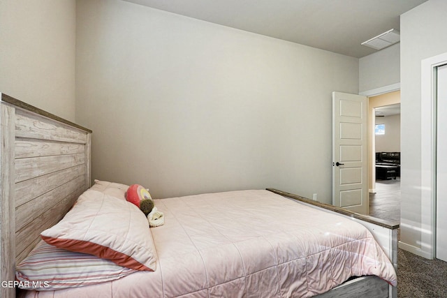 bedroom featuring carpet and visible vents