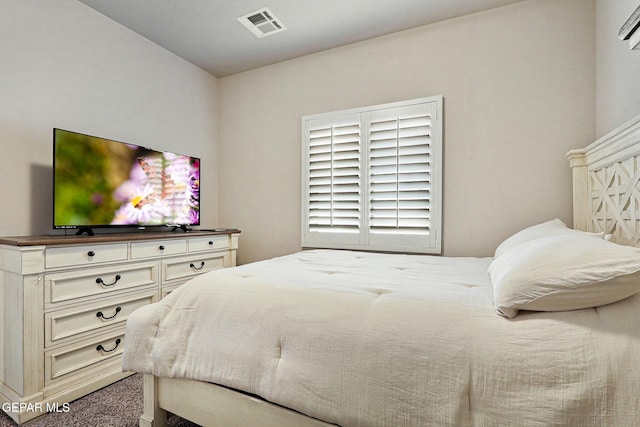 bedroom with visible vents