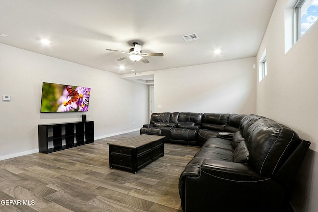 living area with baseboards, visible vents, a ceiling fan, wood finished floors, and recessed lighting