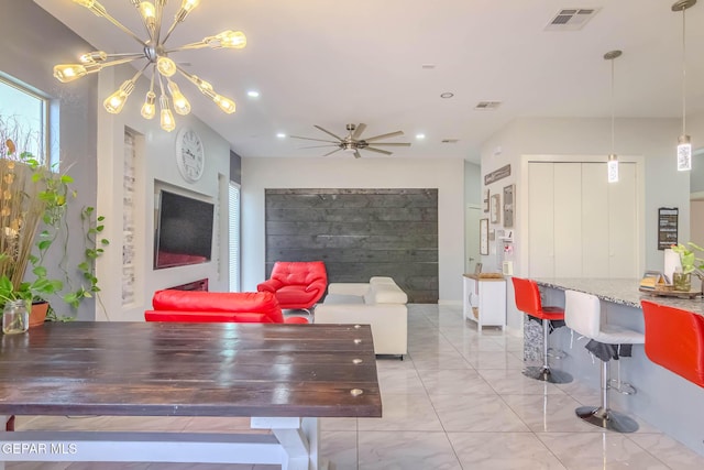 living room featuring recessed lighting, marble finish floor, visible vents, and ceiling fan