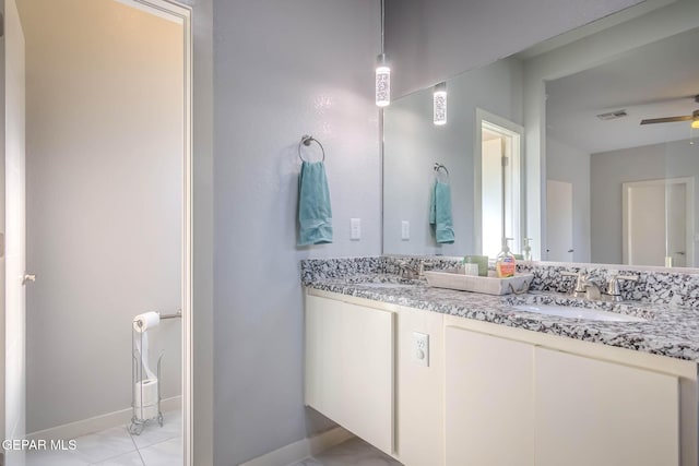 full bathroom featuring double vanity, ceiling fan, visible vents, and a sink