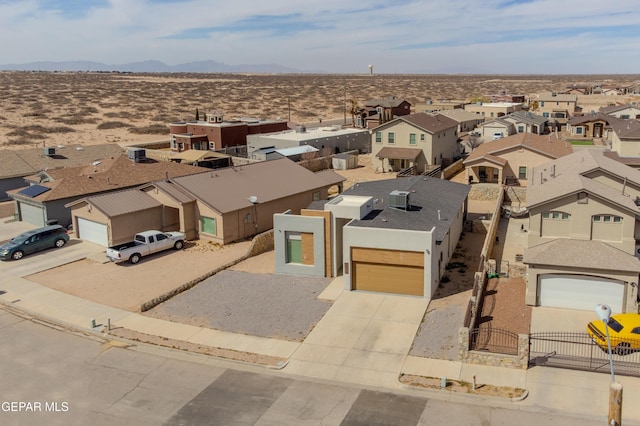 birds eye view of property featuring a residential view and a mountain view