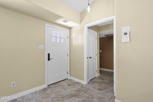 entrance foyer featuring visible vents and baseboards