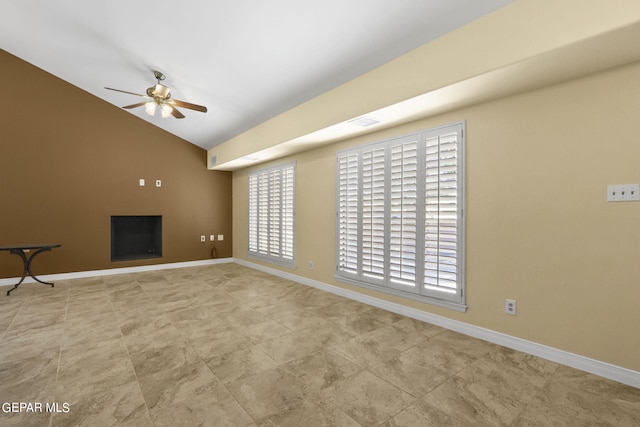 unfurnished living room featuring a ceiling fan, visible vents, vaulted ceiling, and baseboards