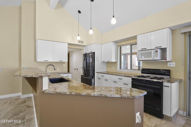 kitchen with black appliances, a sink, white cabinetry, and light stone countertops