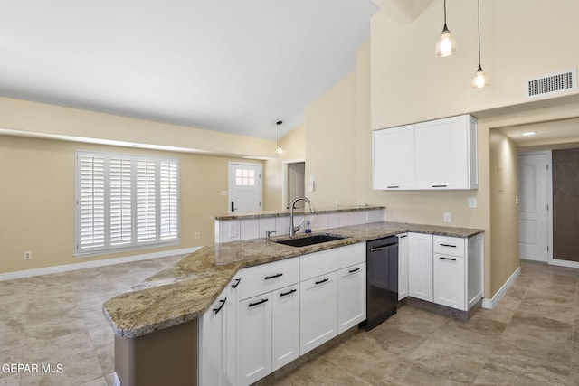 kitchen with light stone counters, a peninsula, a sink, white cabinetry, and dishwasher