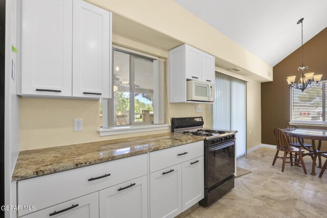 kitchen with lofted ceiling, white microwave, white cabinetry, black range with gas cooktop, and a chandelier