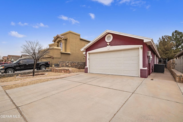 view of front of property with driveway and stucco siding