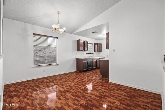 interior space with a textured ceiling, dark brown cabinetry, vaulted ceiling, light countertops, and dishwasher