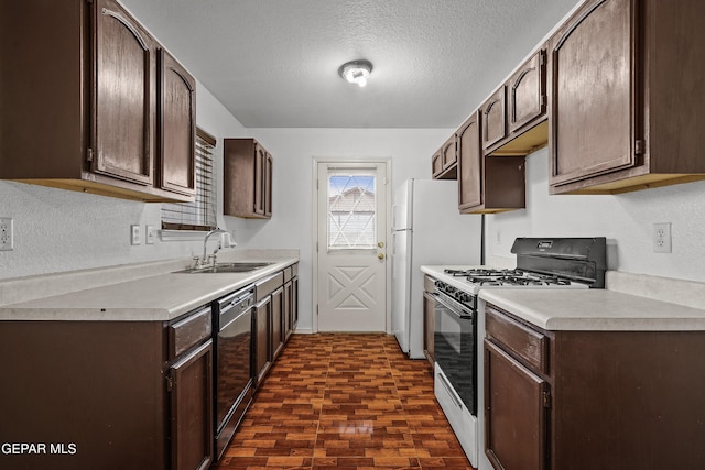 kitchen with dark brown cabinetry, a sink, range with gas stovetop, light countertops, and dishwasher