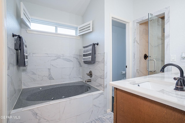 full bathroom with a washtub, vanity, and an enclosed shower