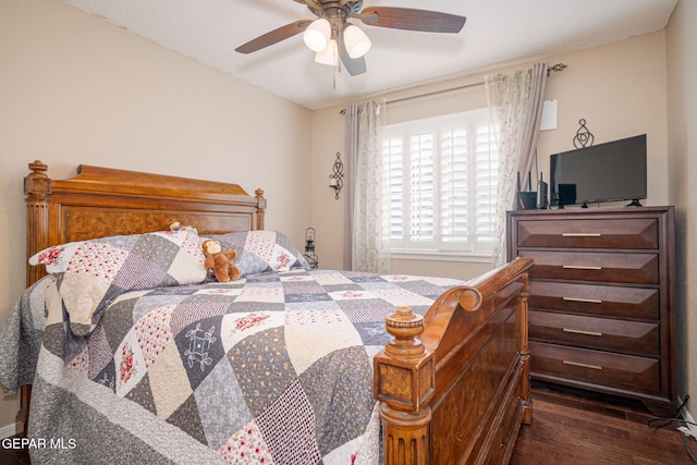 bedroom featuring ceiling fan and wood finished floors