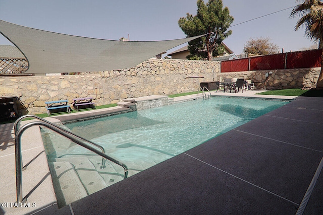 view of pool featuring a patio area, a fenced backyard, and a fenced in pool