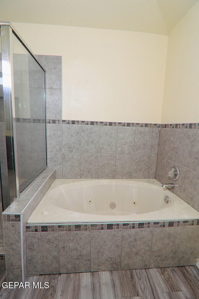 bathroom featuring a jetted tub