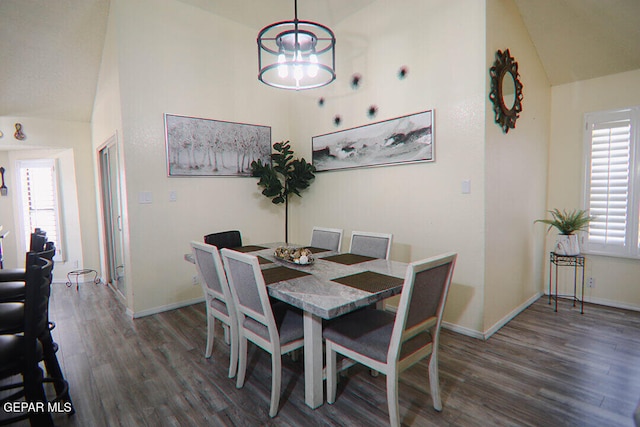 dining room featuring baseboards and wood finished floors