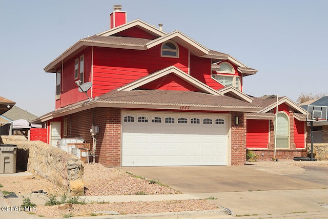 view of front of property with brick siding and driveway