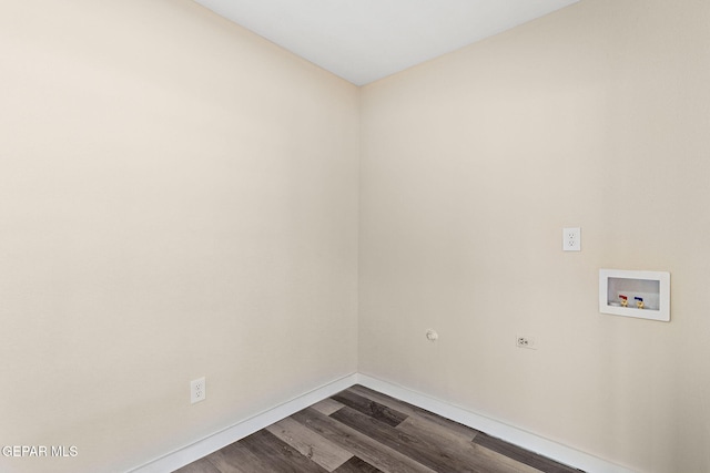 washroom with laundry area, hookup for a washing machine, baseboards, and dark wood-type flooring