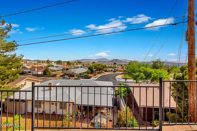 balcony with a mountain view and a residential view