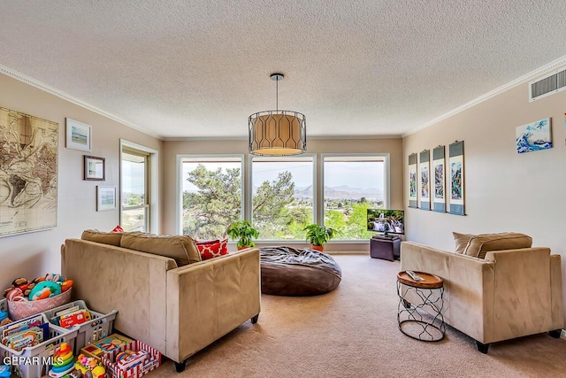 carpeted living area featuring a textured ceiling, plenty of natural light, visible vents, and ornamental molding