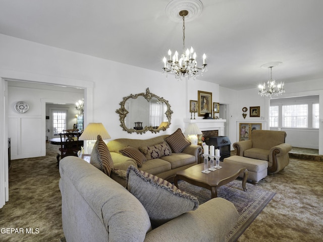 carpeted living room featuring a chandelier, a wealth of natural light, and a brick fireplace