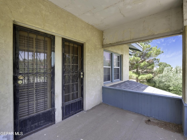 exterior space featuring stucco siding