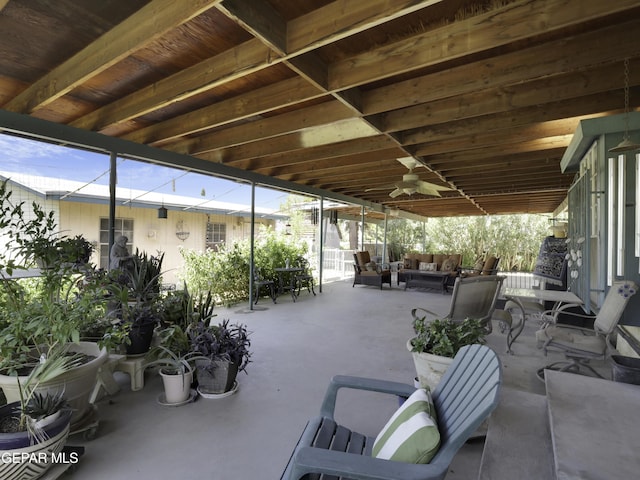 view of patio with ceiling fan and outdoor lounge area