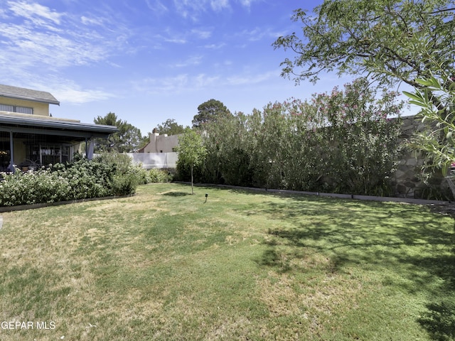 view of yard with fence