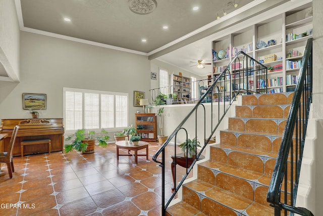 stairs featuring ceiling fan, ornamental molding, recessed lighting, and tile patterned floors