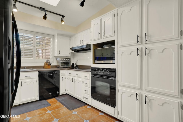 kitchen with white cabinetry, under cabinet range hood, and black appliances