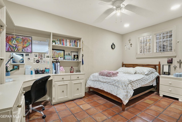 bedroom with a ceiling fan and light tile patterned flooring