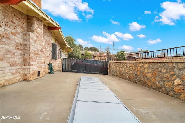 view of patio / terrace with fence