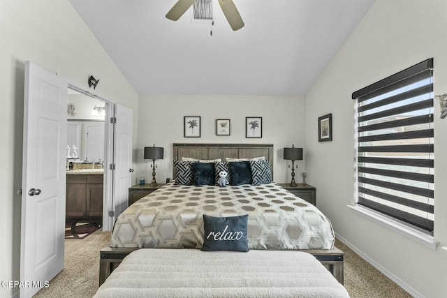 bedroom featuring ceiling fan, baseboards, carpet, and vaulted ceiling