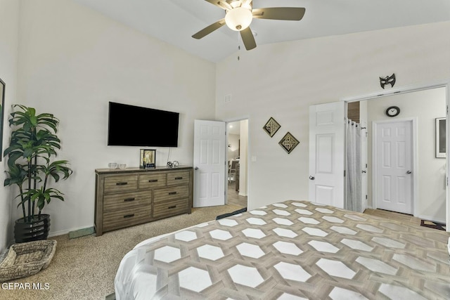 bedroom with high vaulted ceiling and a ceiling fan