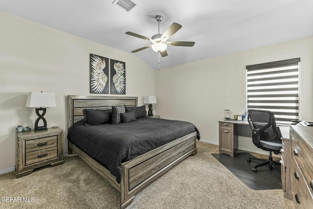 carpeted bedroom with visible vents, ceiling fan, baseboards, and lofted ceiling