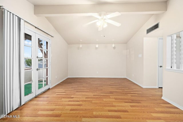 unfurnished room featuring lofted ceiling with beams, light wood finished floors, visible vents, and french doors