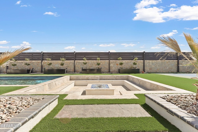 exterior space with a fenced in pool, fence, and an outdoor fire pit