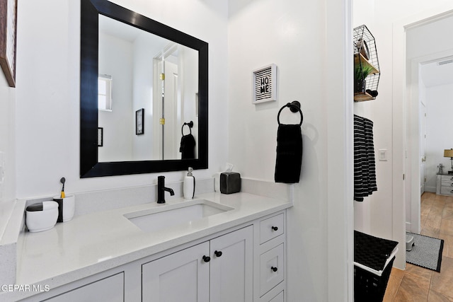 bathroom featuring visible vents and vanity