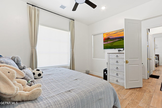 bedroom with visible vents, baseboards, recessed lighting, ceiling fan, and light wood-style floors